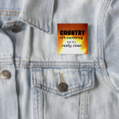 Badge Carré 5 Cm Le pays n'est pas tout (En situation)