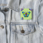 Badge Carré 5 Cm Papillon patchwork sur fond vert (En situation)