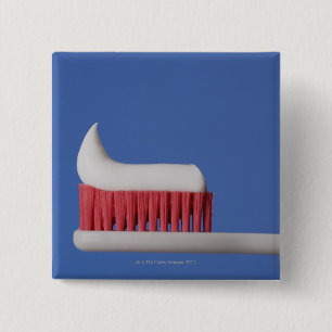 Badge Carré 5 Cm Plan rapproché de pâte dentifrice sur une brosse
