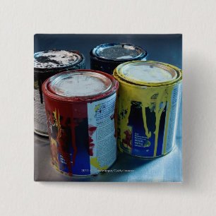 Badge Carré 5 Cm Plan rapproché de quatre boîtes de peinture