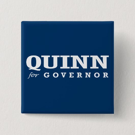 BADGE CARRÉ 5 CM QUINN POUR LE GOUVERNEUR 2014 (Devant)