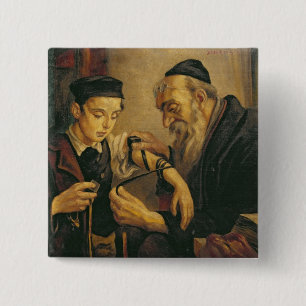 Badge Carré 5 Cm Rabbin attachant les phylactères au bras d'un