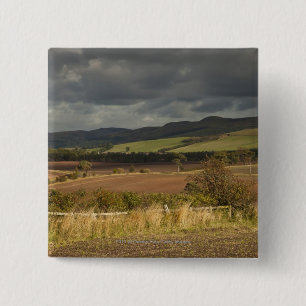 Badge Carré 5 Cm Rolling Hills et montagnes sous un ciel nuageux