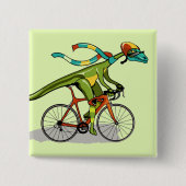 Badge Carré 5 Cm Un Dinosaure Anabisetia À Vélo. (Devant)