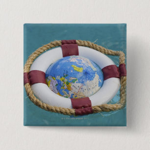 Badge Carré 5 Cm Un globe terrestre flottant