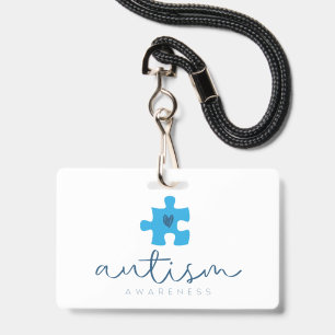 Badge cœur de pièce de puzzle bleu de sensibilisation à