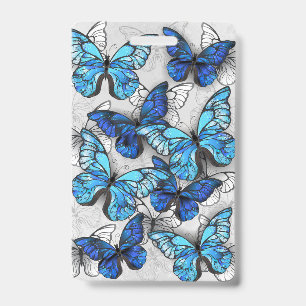 Badge Composition de papillons blancs et bleus
