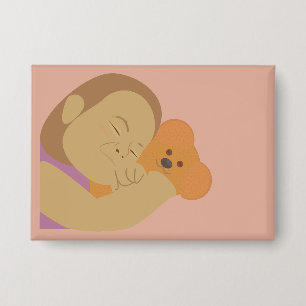 Badge Fille qui étreint un ours