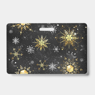 Badge Flocons de neige dorés de Noël sur fond noir