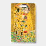 Badge Gustav Klimt Le Baiser<br><div class="desc">Badge représentant le tableau à l'huile de Gustav Klimt avec feuille d'or Le Baiser (1908). Un homme et une femme,  vêtus de couleurs dorées brillantes,  s'étreignent et s'embrassent amoureusement dans un champ de fleurs. Un excellent cadeau pour les fans de l'Art nouveau et de l'art autrichien.</div>