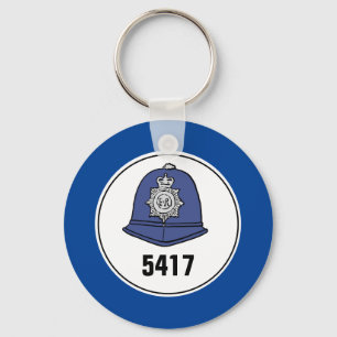 Badge Nummer. Helm Politieagent. Sleutelhanger