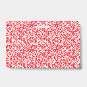 Badge Papier cadeau rouge et orange avec un motif géomét