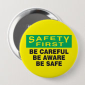 Badge Rond 10 Cm La sécurité d'abord être conscient (Devant & derrière)