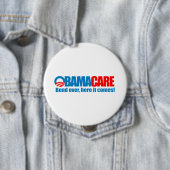 Badge Rond 10 Cm Obamacare - courbure ici elle vient (En situation)