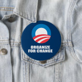 BADGE ROND 10 CM ORGANISER POUR LE CHANGEMENT (En situation)