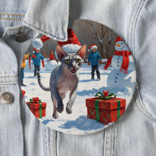 Badge Rond 15,2 Cm Chat Sphynx courant dans la neige avec un chapeau