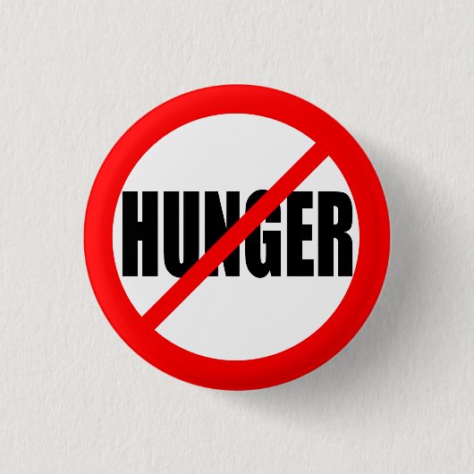 BADGE ROND 2,50 CM "AUCUNE FAIM " (Devant)