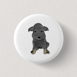 Badge Rond 2,50 Cm Cadeau de chiot au charbon de bois assis avec des