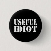 BADGE ROND 2,50 CM IDIOT UTILE (Devant)