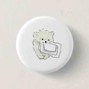Badge Rond 2,50 Cm Joli chiot duveteux portant un cadeau avec un cadr