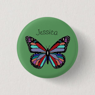 Badge Rond 2,50 Cm Joli papillon coloré sur fond vert personnalisé