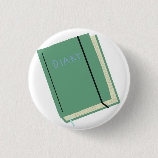 Badge Rond 2,50 Cm Journal Vert Sauge Avec Élastique (Devant)