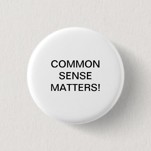 BADGE ROND 2,50 CM LE SENS COMMUN COMPTE! (Devant)