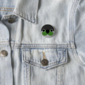 Badge Rond 2,50 Cm Le visage d'une perruque verte (En situation)