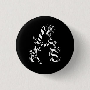 Badge Rond 2,50 Cm LETTRE NOIRE ET BLANCHE "A" AVEC FLEURS Jumelantes