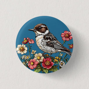 Badge Rond 2,50 Cm Oiseau encadré par des fleurs vibrantes
