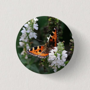Badge Rond 2,50 Cm Papillon orange et fleurs blanches