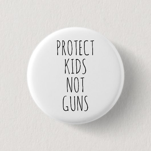 Badge Rond 2,50 Cm Protéger les enfants Pas d'armes blanc noir écrit (Devant)