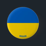 Badge Rond 5 Cm Bouton patriotique de charme du drapeau ukrainien<br><div class="desc">Le drapeau ukrainien Bouton patriotique de charme avec le drapeau ukrainien imprimé sur le bouton. Le nom du pays est subtilement intégré dans la conception du fond. Le texte est entièrement personnalisable à l'aide de la fonction "Customiser !". Ce beau bouton Ukraine est le cadeau élégant pour toute occasion. ©...</div>