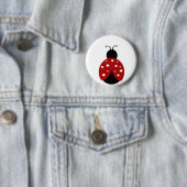 Badge Rond 5 Cm Coccinelle noire et rouge de coeur (En situation)