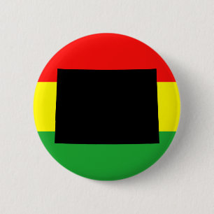 Badge Rond 5 Cm Colorado noir sur les couleurs de Rasta