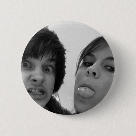 BADGE ROND 5 CM E ET H (Devant)
