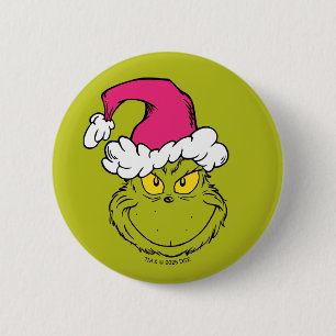 Badge Rond 5 Cm Grinch avec un chapeau de Père Noël rose