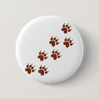 Badge Rond 5 Cm icône représentant les traces du pavé brun