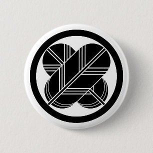 Badge Rond 5 Cm Intersecting hawk feathers with foot in circle