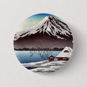 Badge Rond 5 Cm La petite neige a couvert le bâtiment sur la côt
