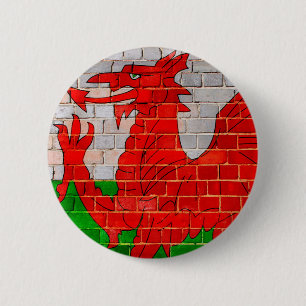 Badge Rond 5 Cm Le drapeau du Pays de Galles sur un mur en brique