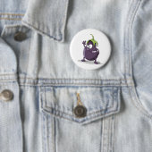 Badge Rond 5 Cm Oeil végétal pourpre d'aubergine (En situation)