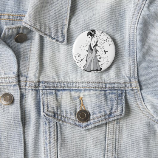 BADGE ROND 5 CM POUPÉE D'ACU (En situation)