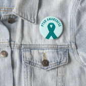 Badge Rond 5 Cm Risque Turquoise de sensibilisation au SSPT (En situation)