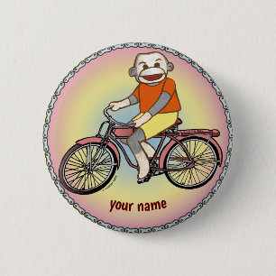 Badge Rond 5 Cm Singe en chaussette Bicyclette