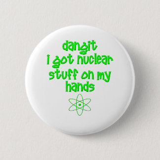 Badge Rond 5 Cm Substance nucléaire sur des mains