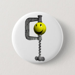 Badge Rond 5 Cm tête jaune attrapée dans un vice