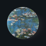 Badge Rond 5 Cm Waterlilies by Claude Monet, Vintage Impressionism<br><div class="desc">Waterlilies (1914) by Claude Monet is a vintage impressionist fine art nature painting. One of many variations of water lily floral paintings that Monet painted by the pond in his flower garden in Giverny, France. About the artist: Claude Monet (1840-1926) was a founder of the French impressionist painting movement with...</div>