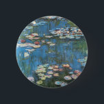 Badge Rond 5 Cm Waterlilies by Claude Monet, Vintage Impressionism<br><div class="desc">Waterlilies (1914) by Claude Monet is a vintage impressionist fine art nature painting. One of many variations of water lily floral paintings that Monet painted by the pond in his flower garden in Giverny, France. About the artist: Claude Monet (1840-1926) was a founder of the French impressionist painting movement with...</div>