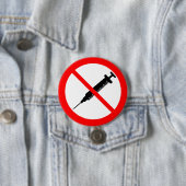 BADGE ROND 7,6 CM "ANTI-VACCIN" (En situation)